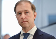 Мантуров: возврат западных компаний в РФ возможен лишь после отмены санкций